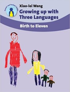 Book cover: Growing up with three languages